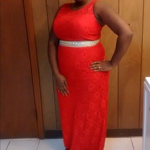 Red Lace Dress with a gold trim around the waist.